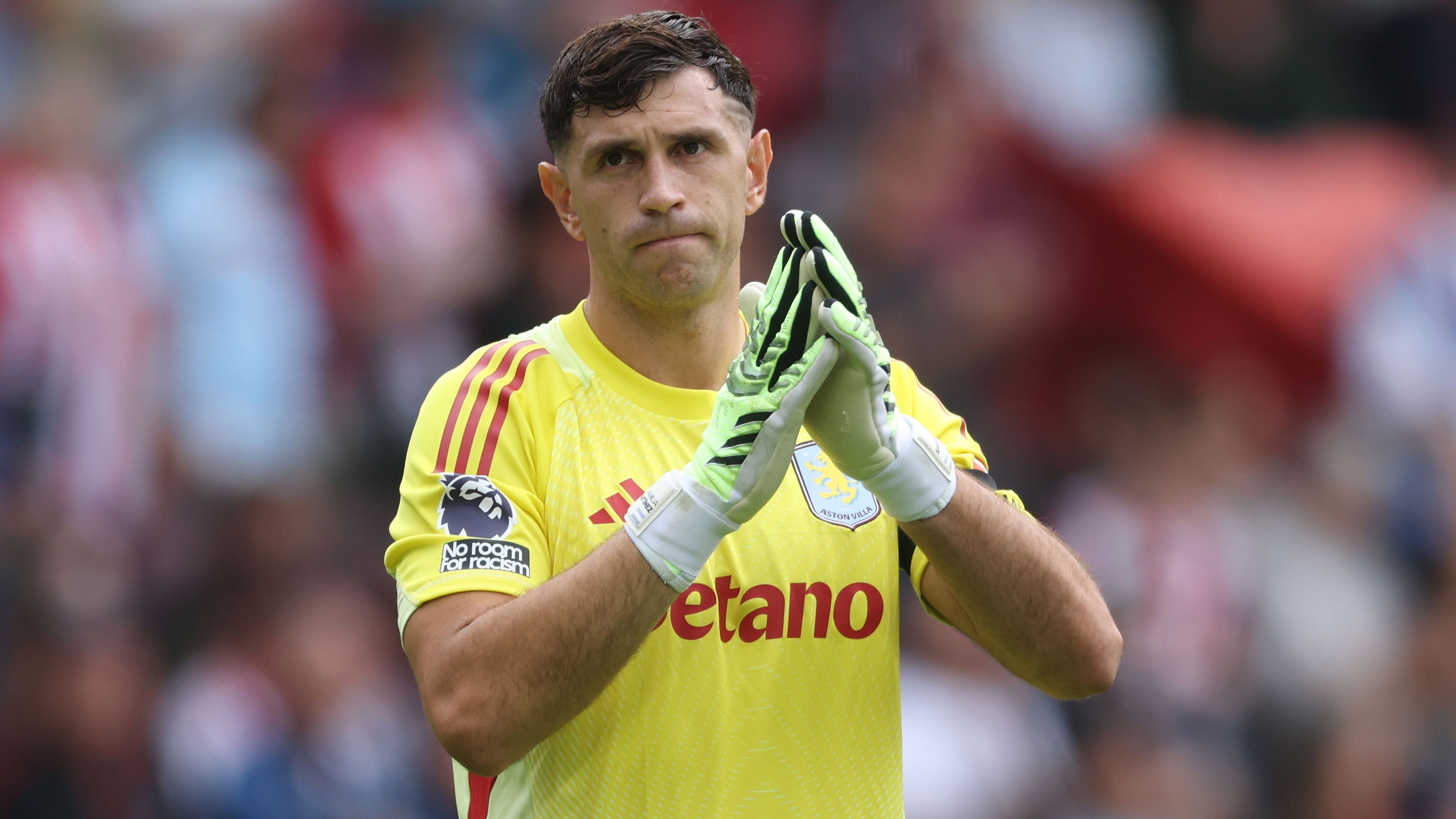 Emi Martinez Excluded from Aston Villa's Starting Lineup Amid Manchester United Transfer Speculation; Marc Guehi Features for Crystal Palace