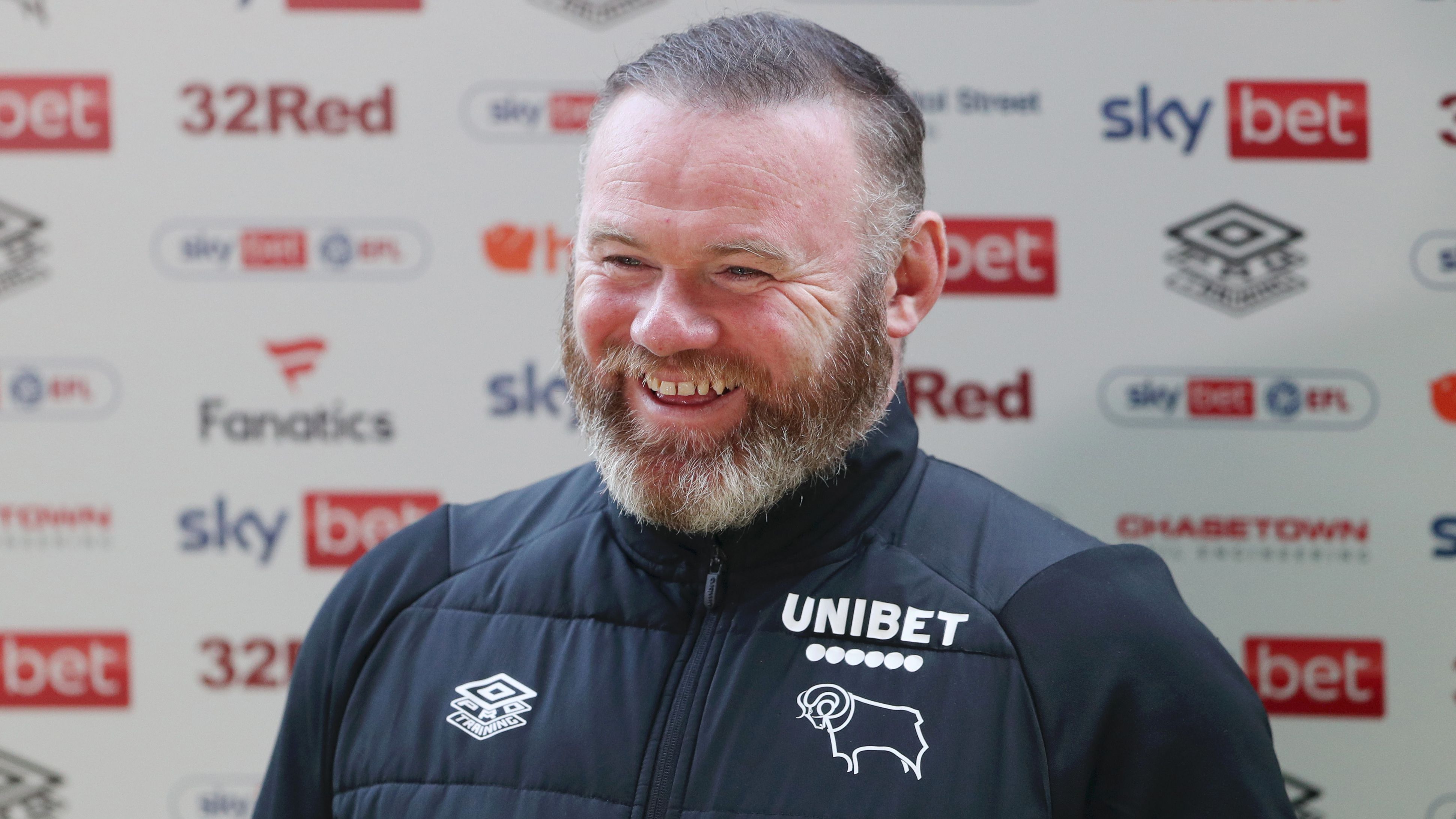 Wayne Rooney Reveals Unusual Water Park Encounter with Transfer Target During Championship Role