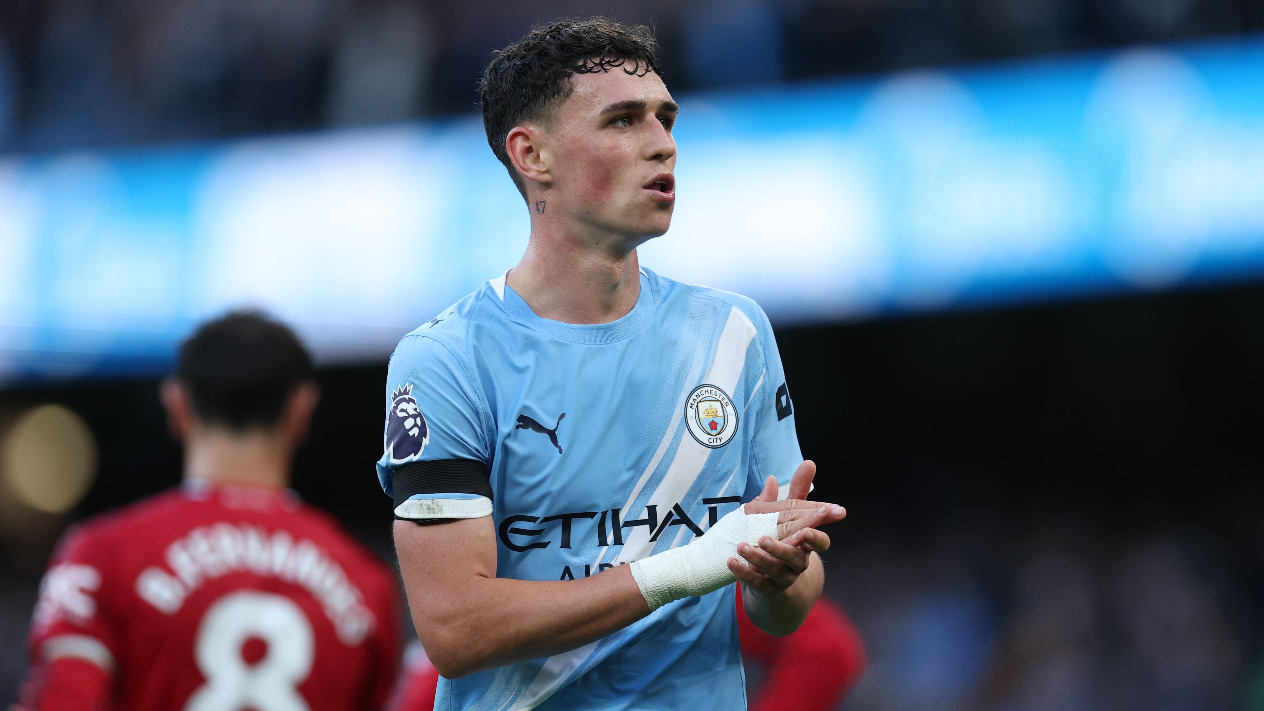 Pep Guardiola Hails Erling Haaland's Derby Brace as Surpassing Treble Season Glory, While Commending Phil Foden as the Heart of the Club