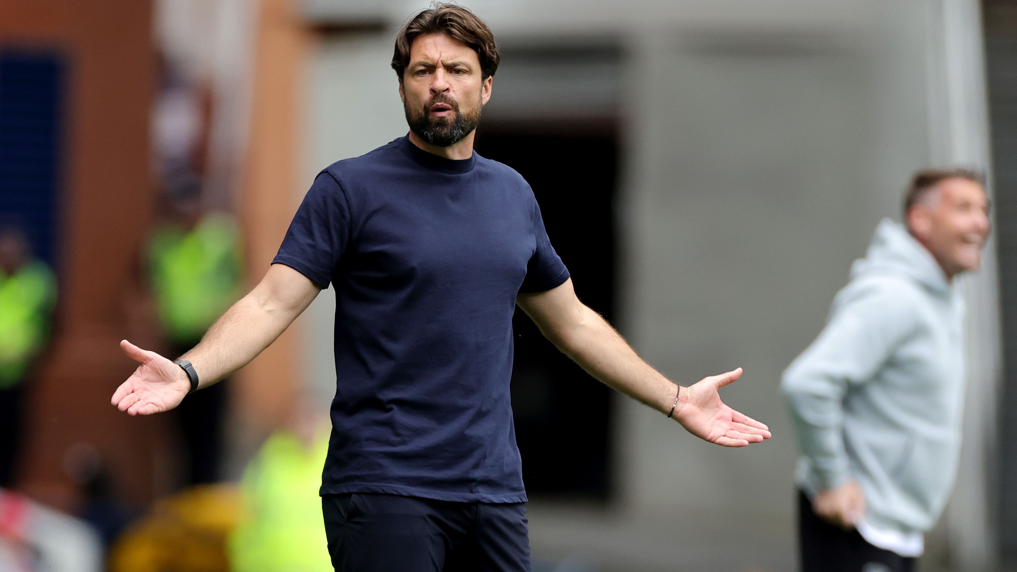 Under-fire Rangers boss Russell Martin brutally branded a ‘shallow Pep Guardiola imposter' after nightmare season continues with home defeat to Hearts